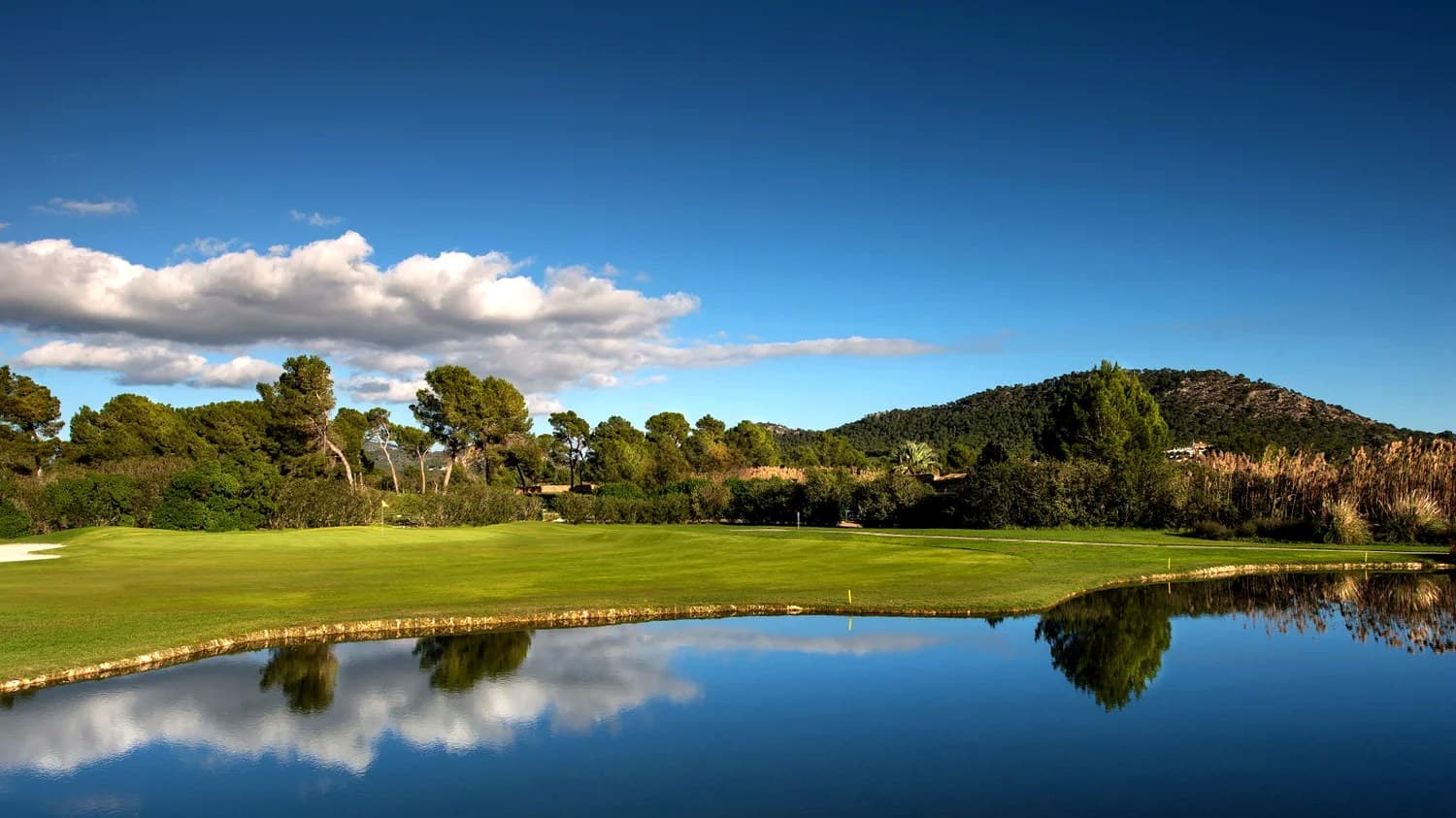 Golf Santa Ponsa 1 with water reflection and fairway