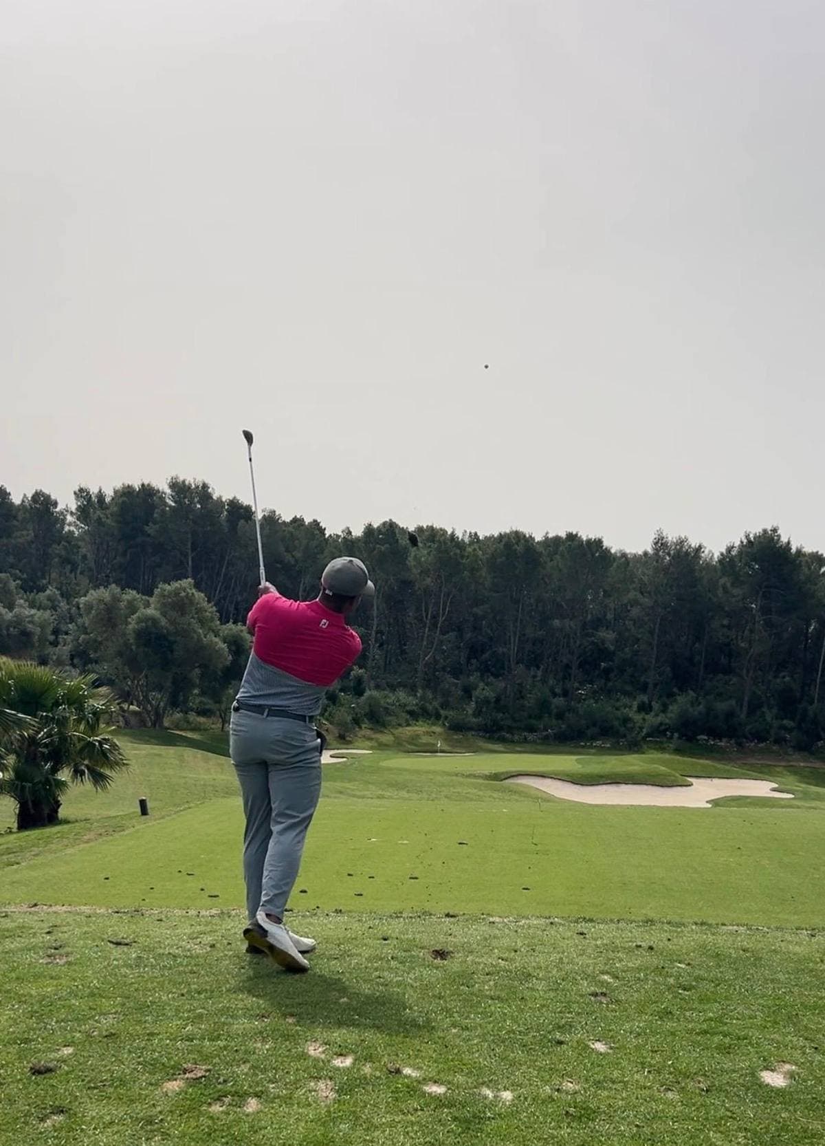Andy Griffiths hitting tee shot on 13th par 3 at Son Muntaner Mallorca