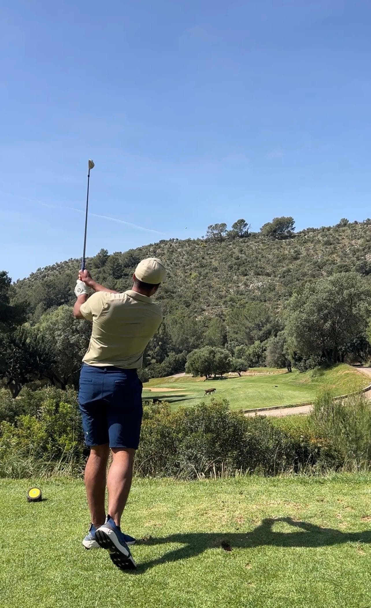 Tee shot at Son Termes golf course Mallorca with mountains behind