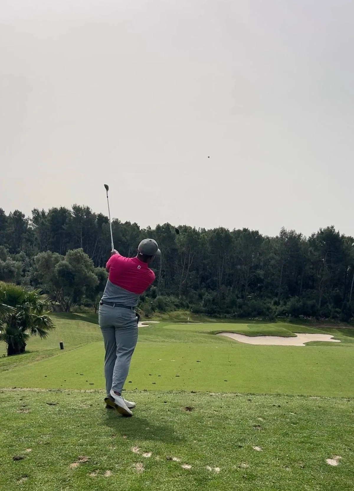 Andy Griffiths hitting tee shot on 13th par 3 at Son Muntaner Mallorca